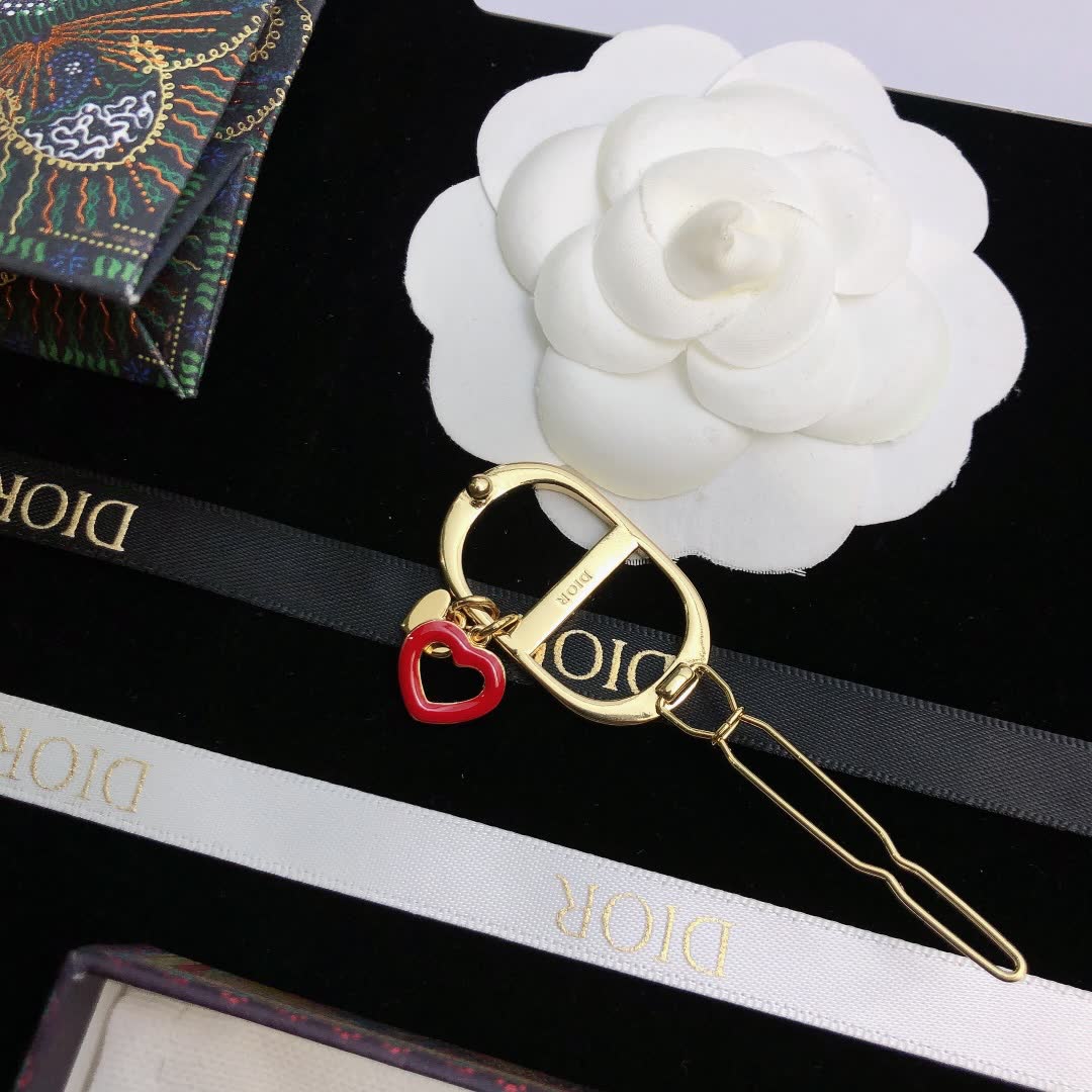 Dior Gold Tone Hair Clip with Red Heart Charm